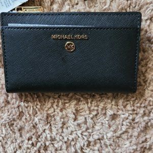 Jet Set Charm Pebbled Leather Wallet